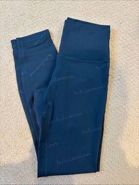 LULULEMON BLUE LOGO LEGGINGS SIZE 4